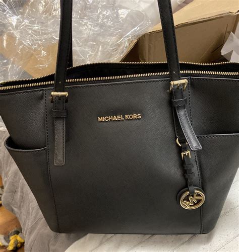 Michael Kors handbags repair